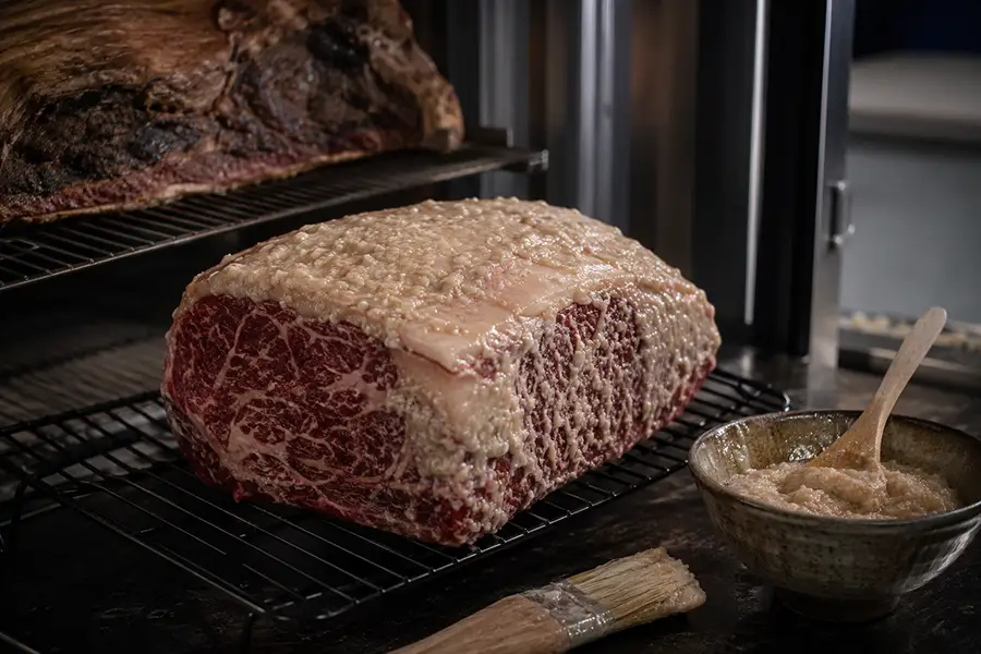 Using koji to mimic dry-aging in meats